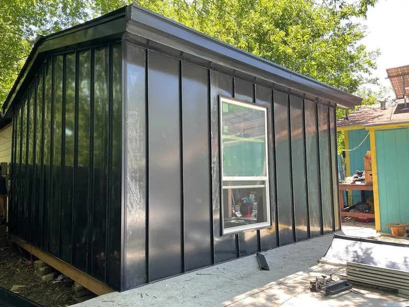 Black standing seam metal wall panels for Roof Inspection in Jackson